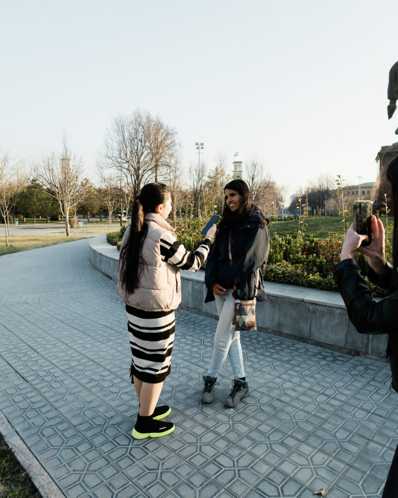 A group of university students interviewing in Amir Temur Square