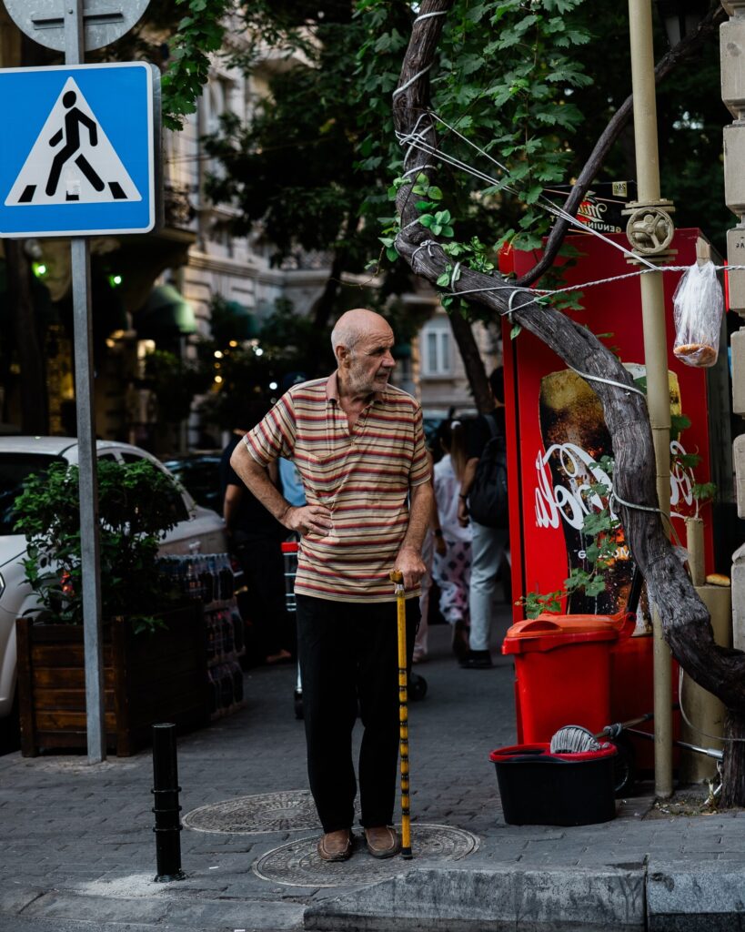 Baku Street Photography - A man waiting at the pedestrian crossing